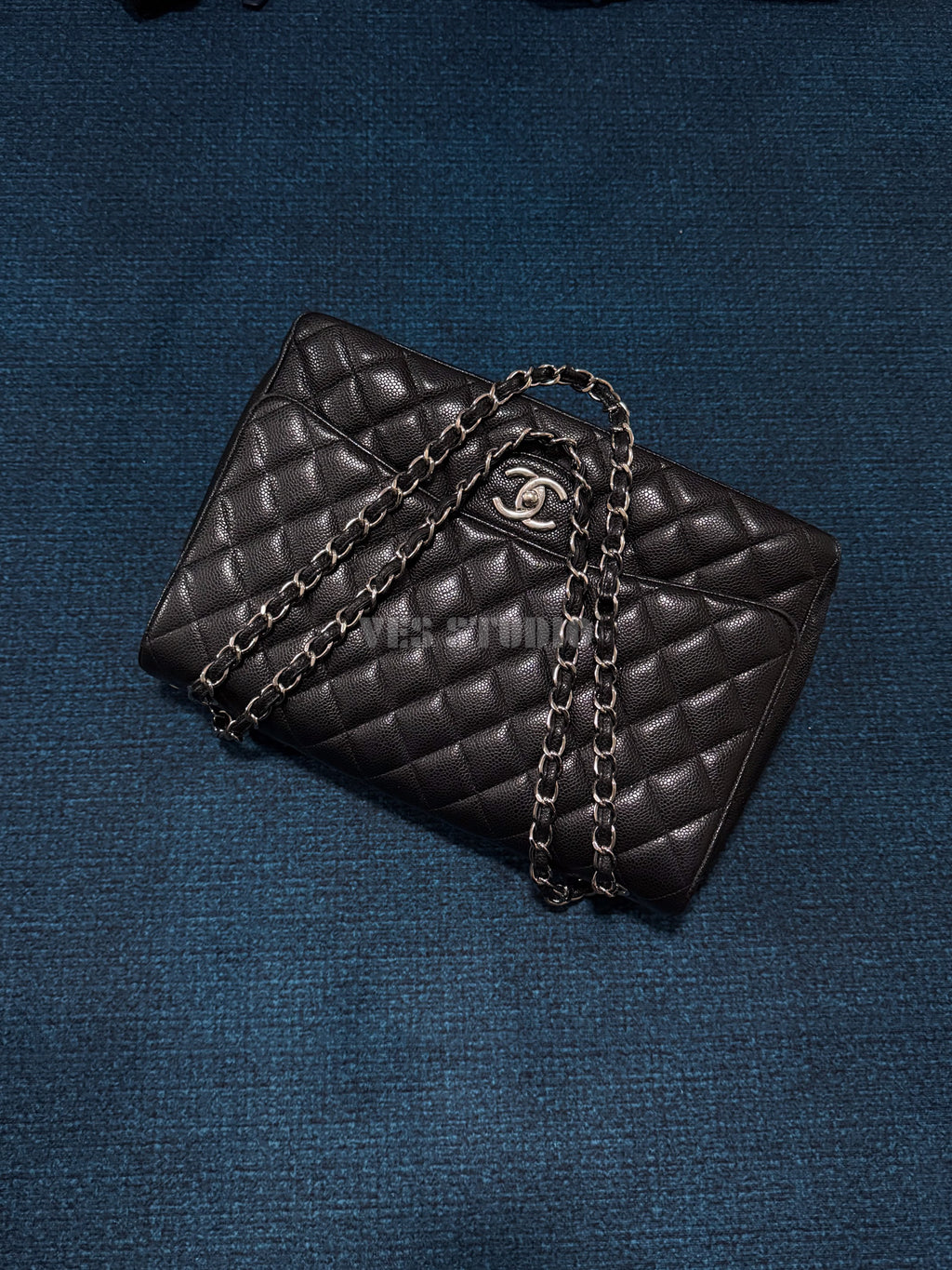 Chanel Maxi Classic Flap Bag in Black Caviar Leather with Silver Hardware