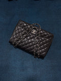 Chanel Maxi Classic Flap Bag in Black Caviar Leather with Silver Hardware