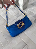 Fendi blue satin Baguette shoulder bag featuring a spider crystal clasp.