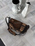 Fendi Zucca limited-edition zebra-print patchwork Baguette bag.