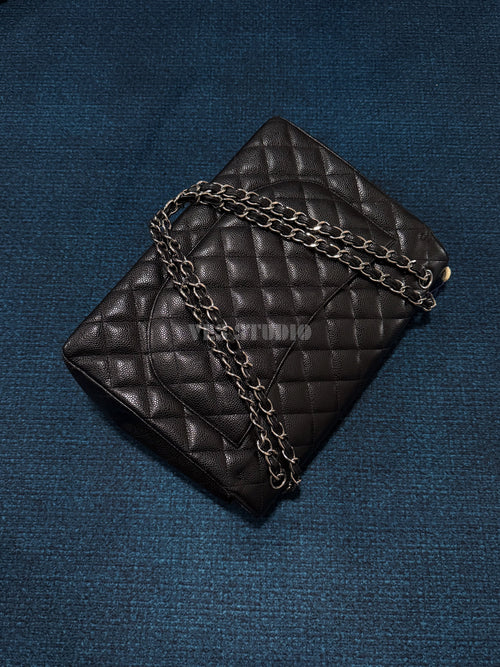 Chanel Maxi Classic Flap Bag in Black Caviar Leather with Silver Hardware