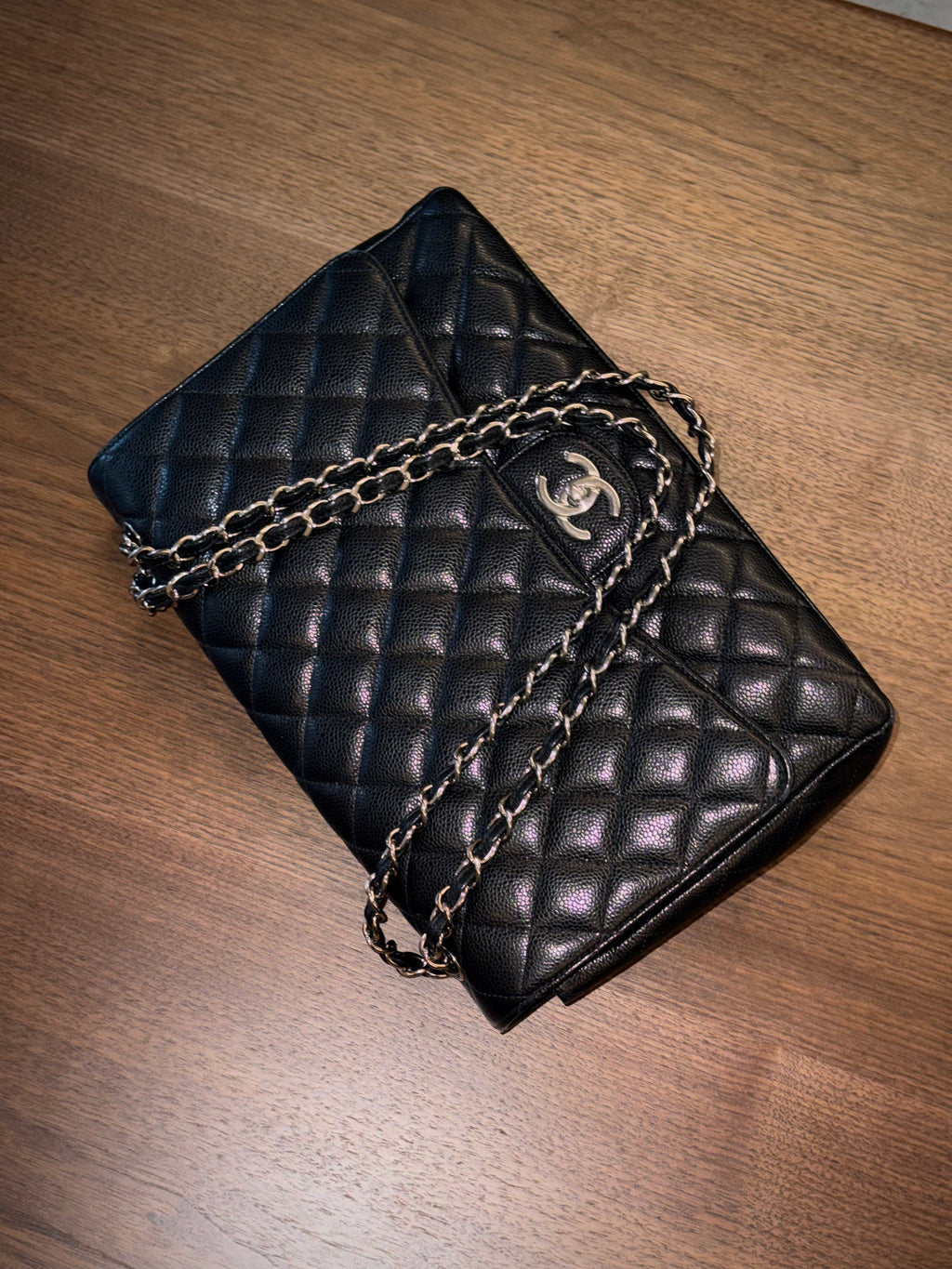 Chanel Maxi Classic Flap Bag in Black Caviar Leather with Silver Hardware