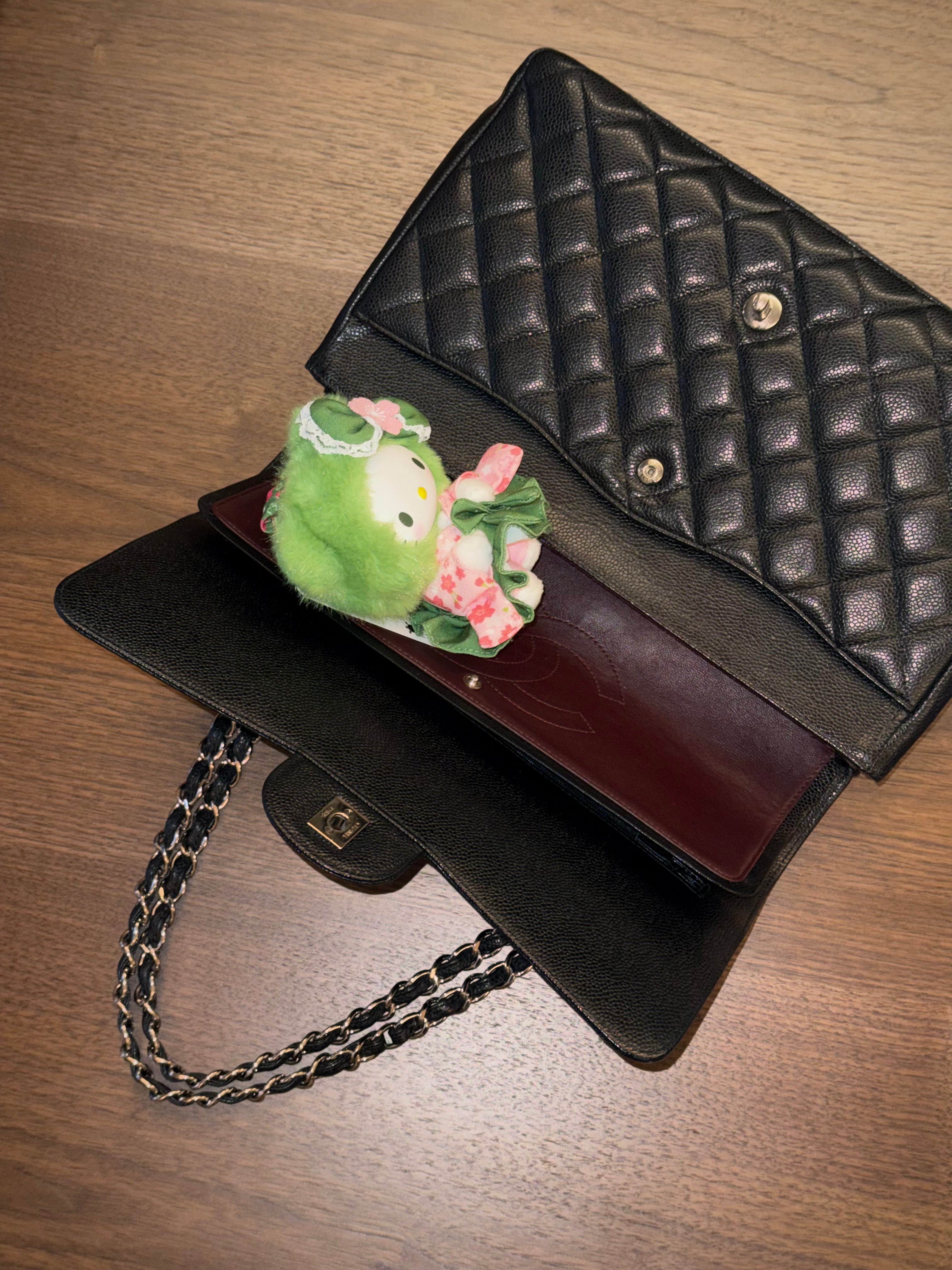 Chanel Maxi Classic Flap Bag in Black Caviar Leather with Silver Hardware