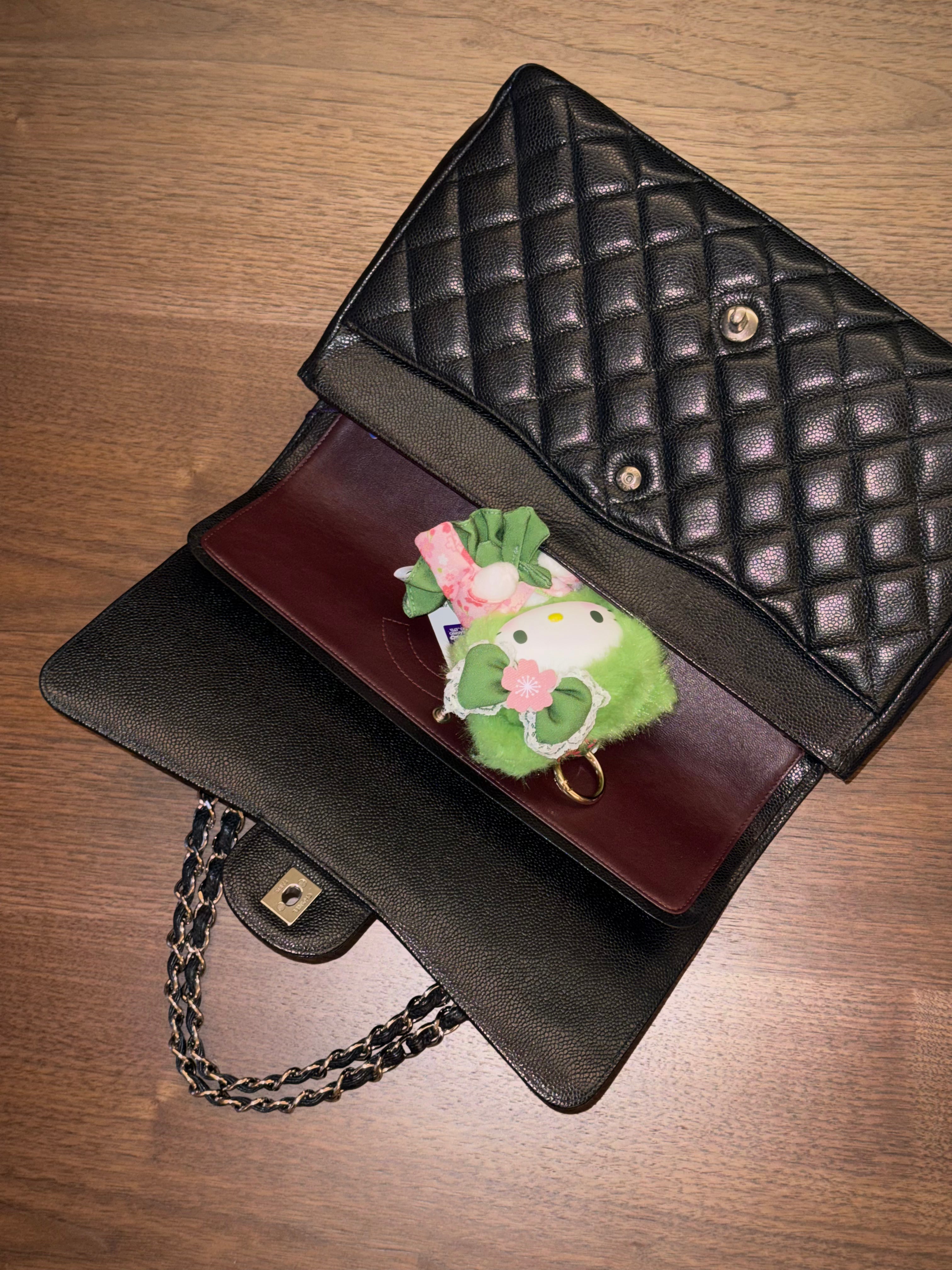 Chanel Maxi Classic Flap Bag in Black Caviar Leather with Silver Hardware