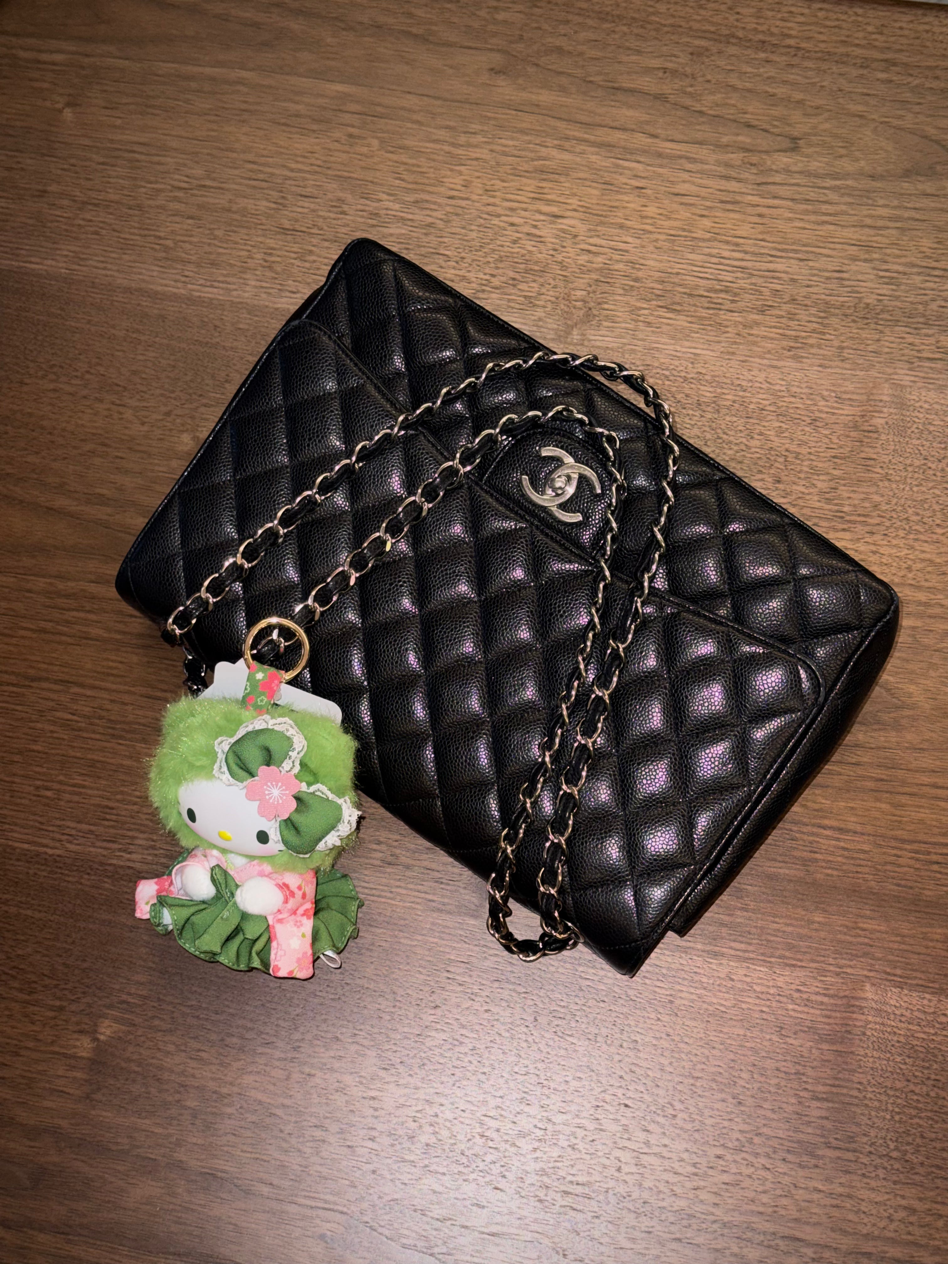 Chanel Maxi Classic Flap Bag in Black Caviar Leather with Silver Hardware