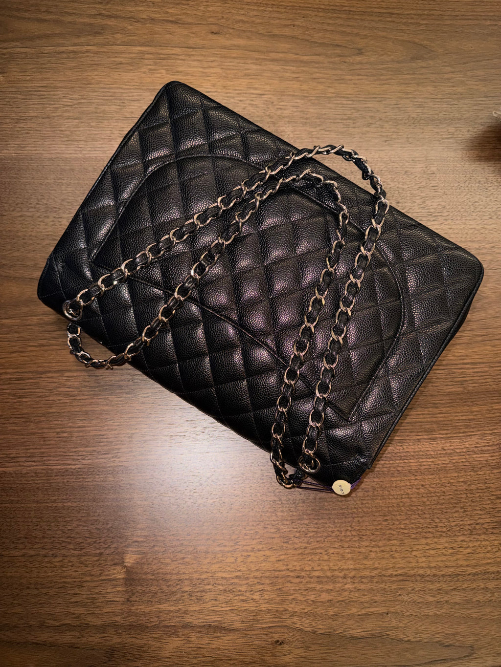 Chanel Maxi Classic Flap Bag in Black Caviar Leather with Silver Hardware