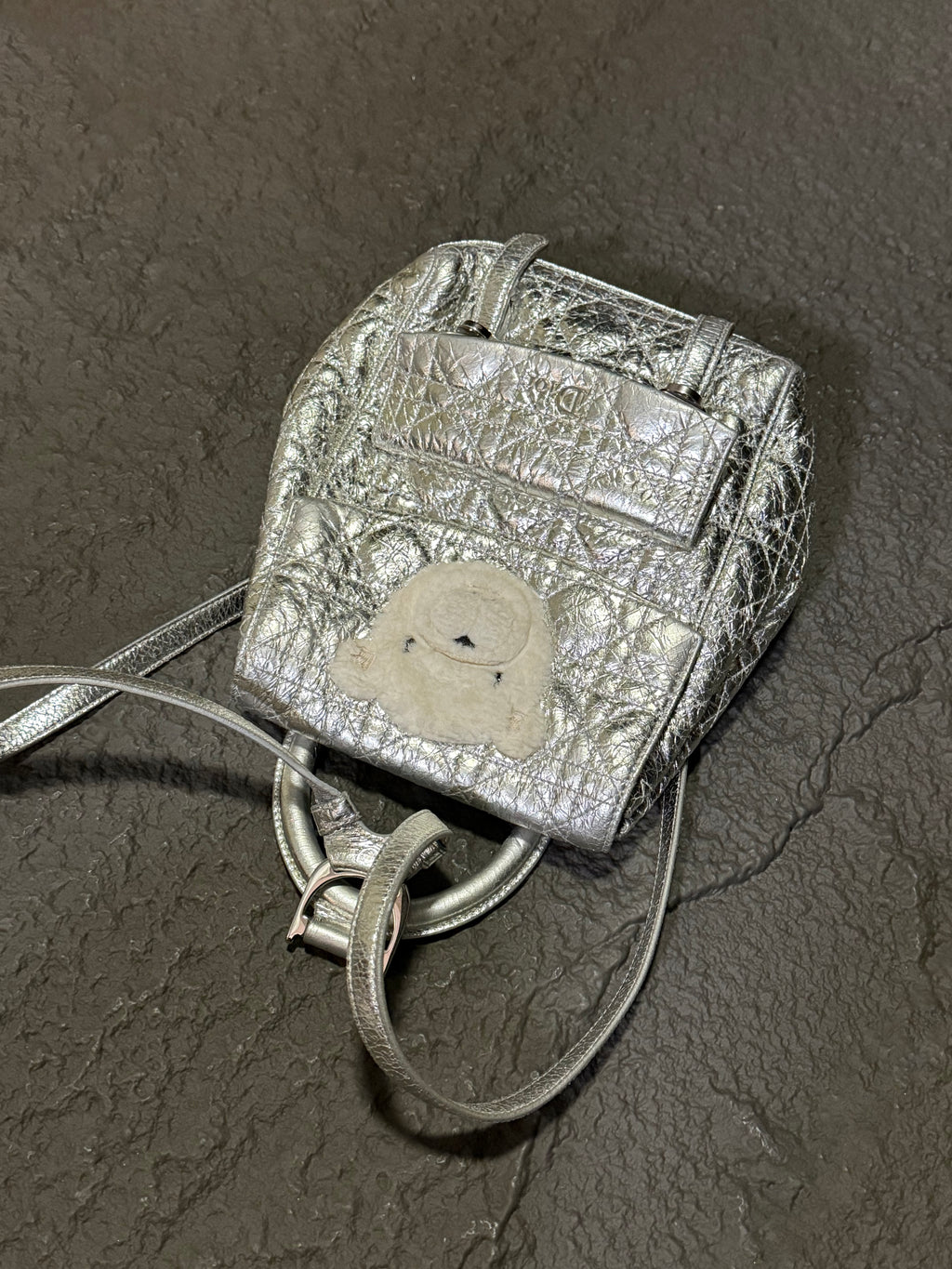 Dior Stardust cracked-finish silver Teddy bear backpack