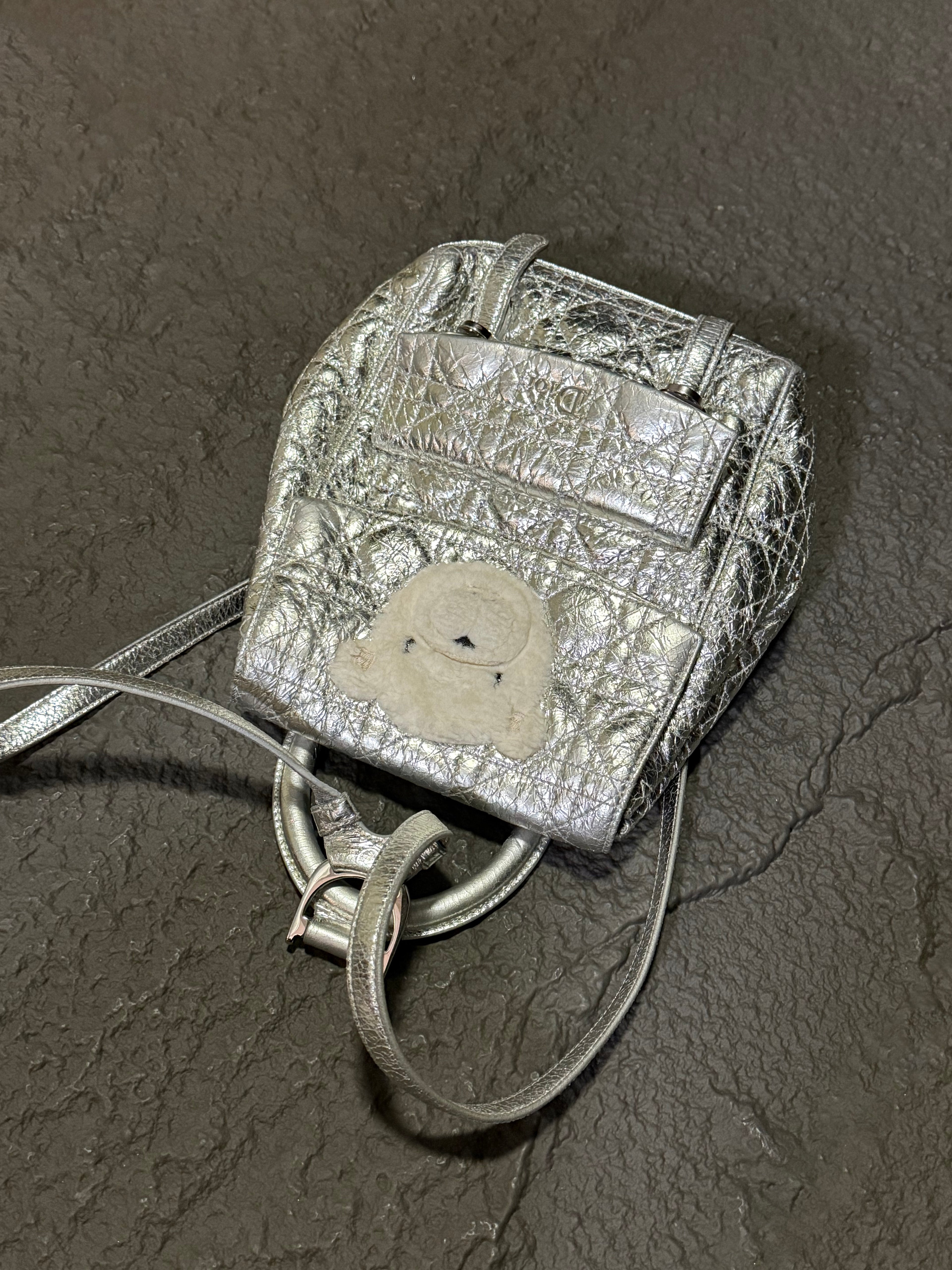Dior Stardust cracked-finish silver Teddy bear backpack