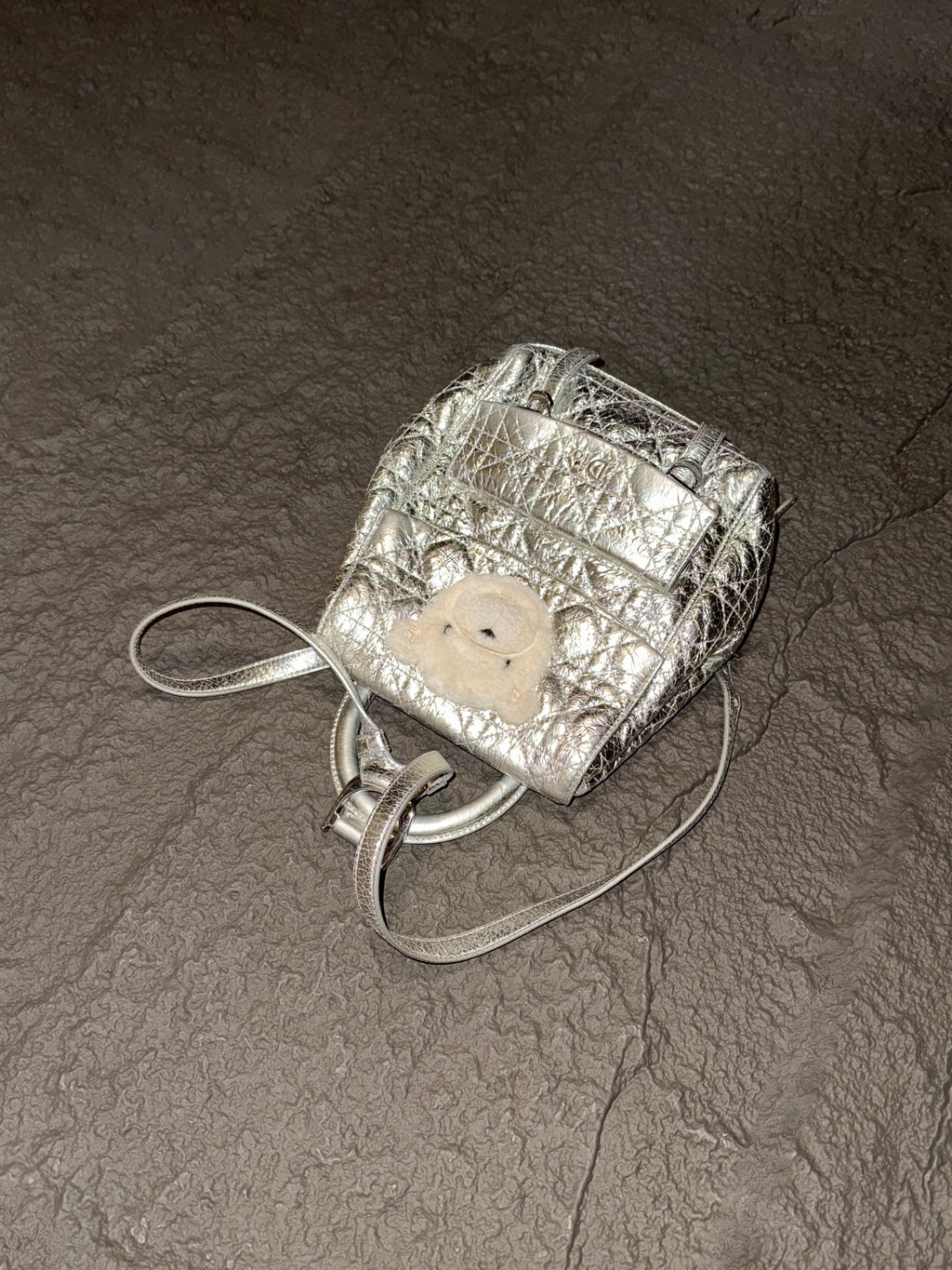 Dior Stardust cracked-finish silver Teddy bear backpack