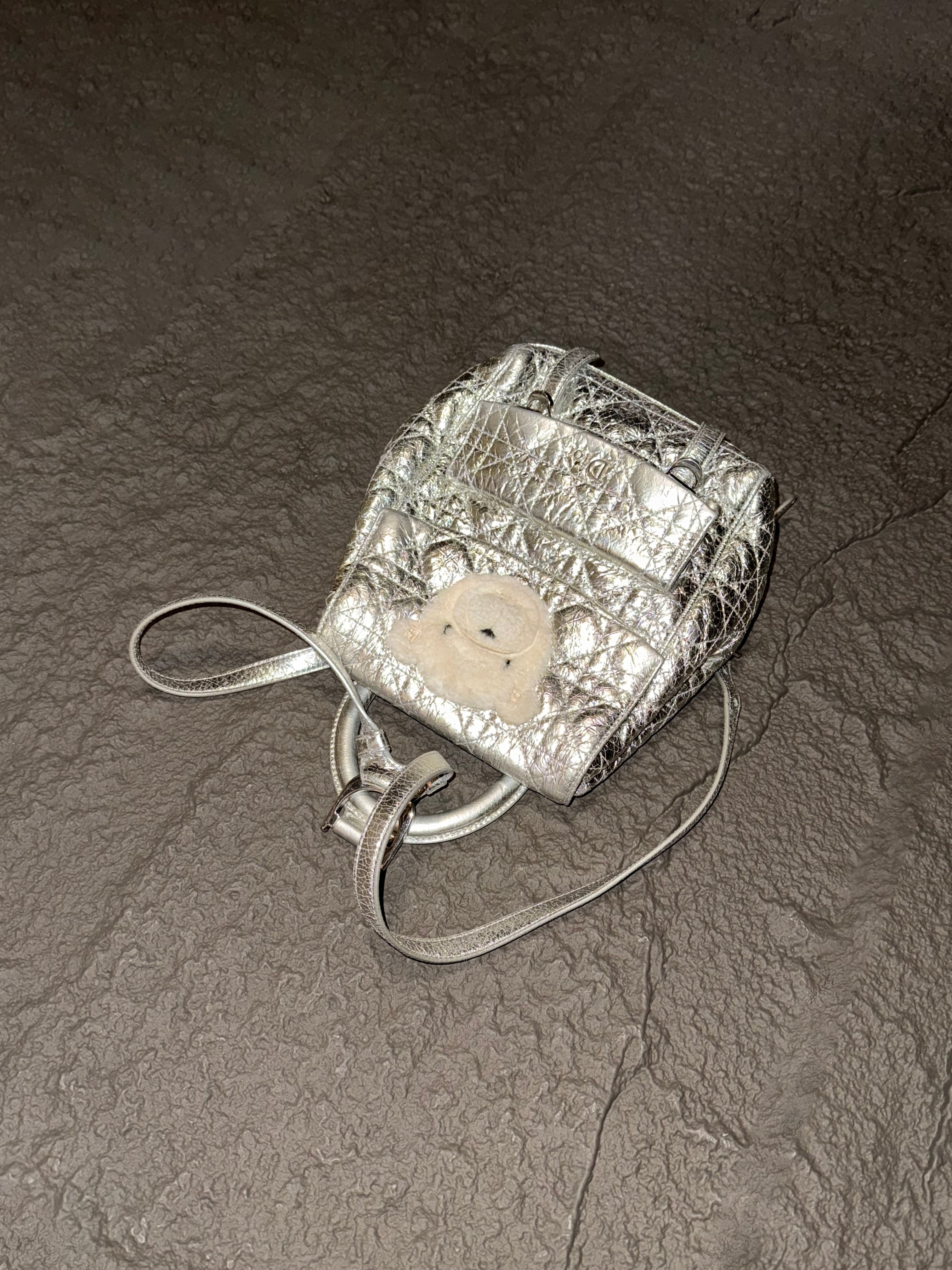 Dior Stardust cracked-finish silver Teddy bear backpack